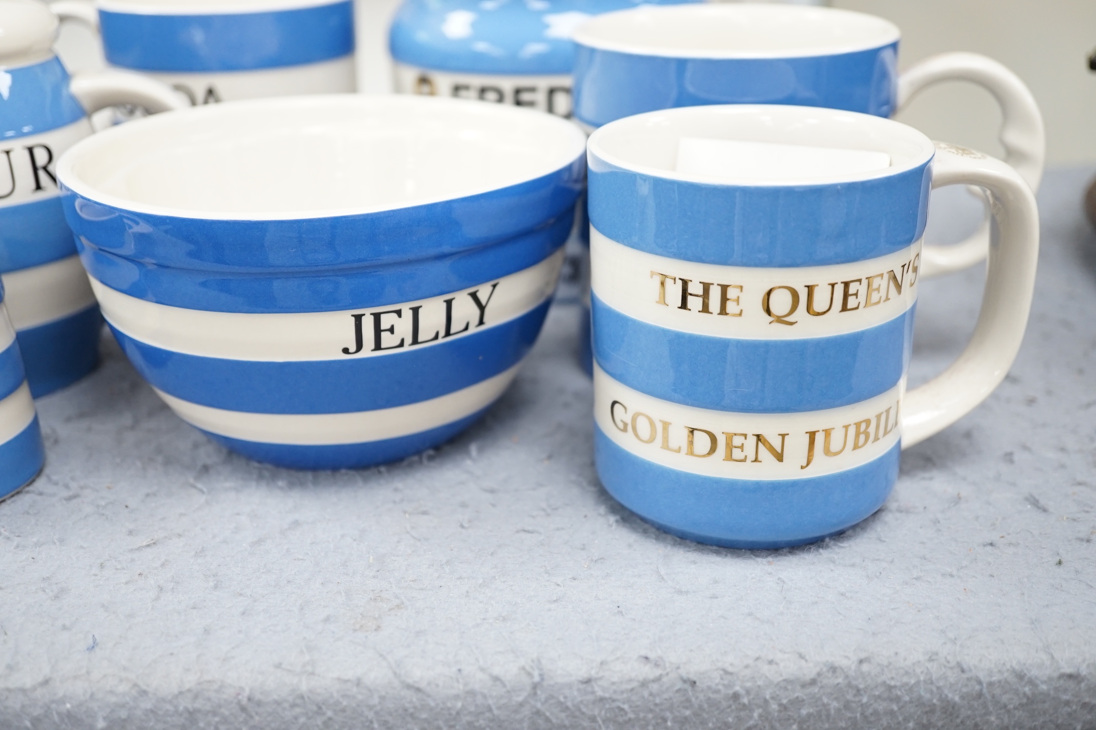 T.G.Green Cornish Kitchenware, nine modern limited edition pieces, to include a Fred's Tea lidded storage jar, 17cm high, Cocoa mug, jelly mould, flour sifter, etc. Condition - good